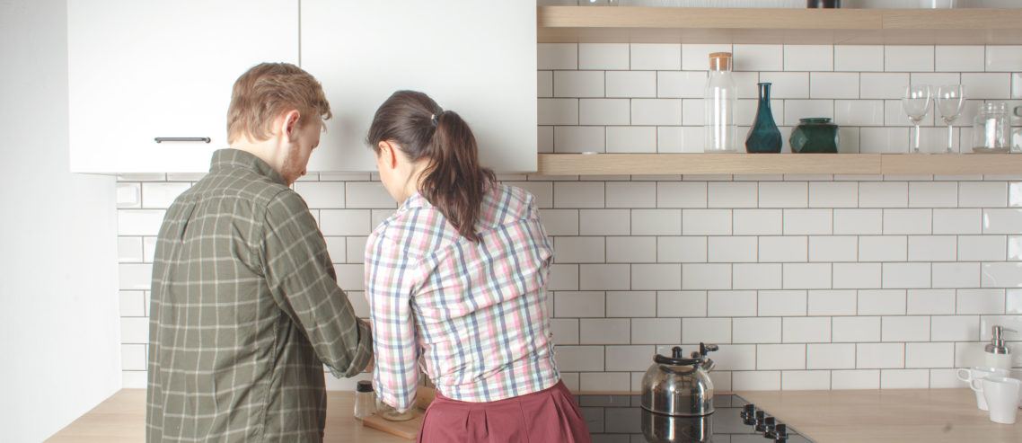 Couple helping each other