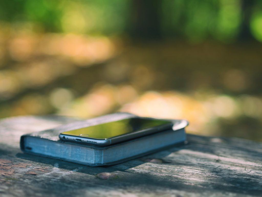 Bible with cell phone